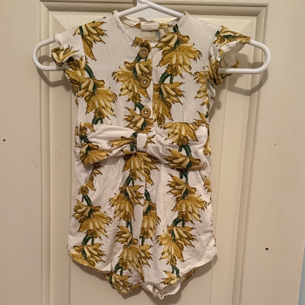 Kate Quinn, the Woods romper with bow.  Floral Yellow and Green 3-6 months